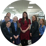 Teresa and students smiling for the camera